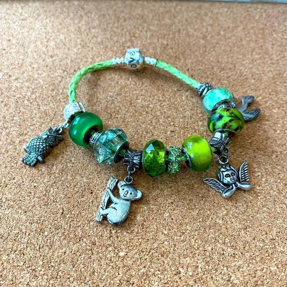 Green child charm bracelet koala